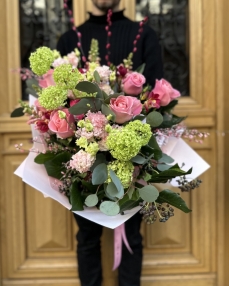 Bouquet with roses in spring colors  