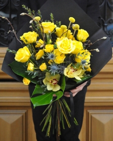 Funerary bouquet with yellow roses and cymbidium orchid 