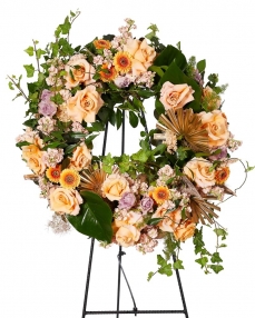 Funeral crown with roses and mathiola
