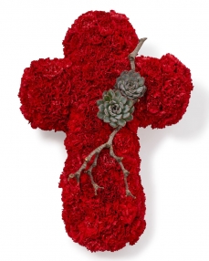 Funeral cross with red dianthus