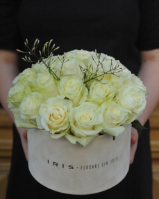 Box with 23 white roses