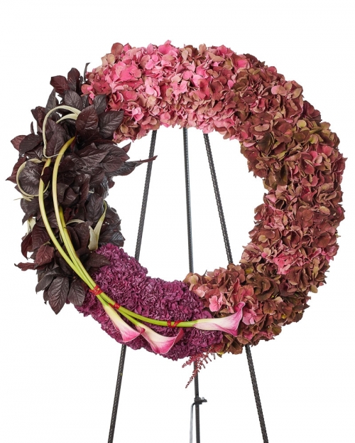 Funeral crown with hydrangea and dianthus