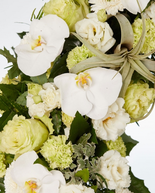 Funeral crown with roses and lisianthus