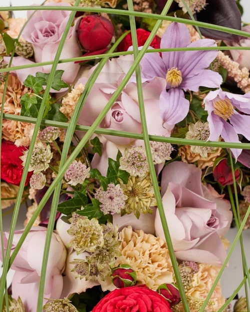 Funeral cross with cala and roses