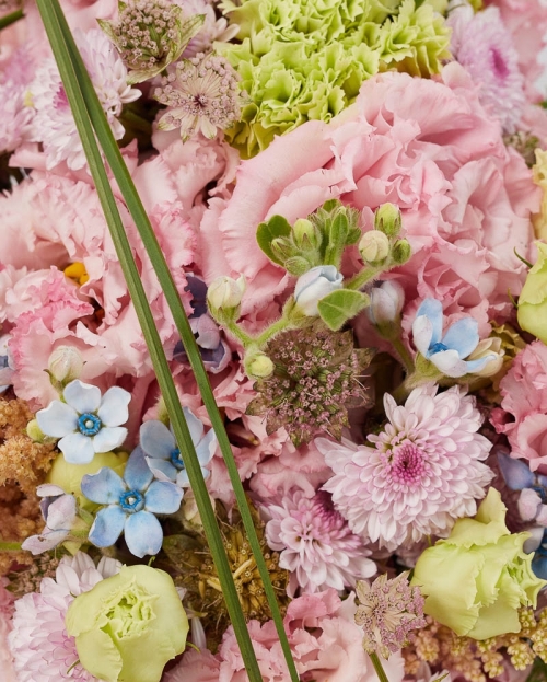 Funeral cross with lisianthus and astilbe